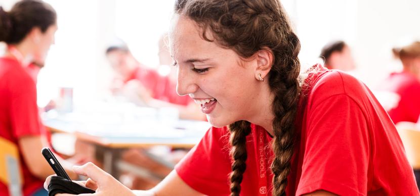 student using her mobile