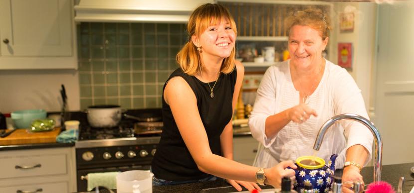 girl cooking with a host