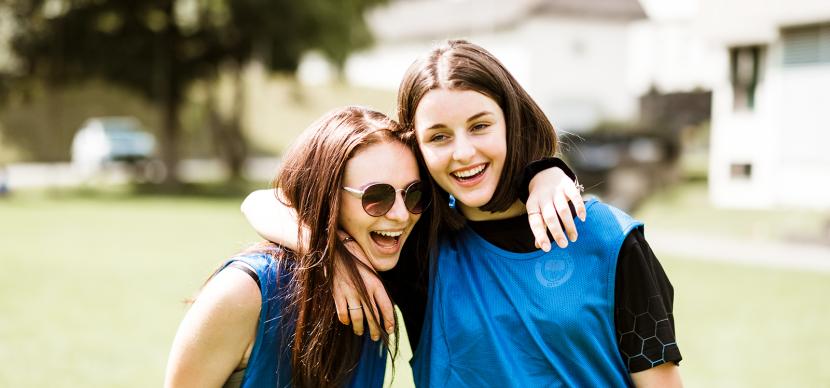 two girls hugging