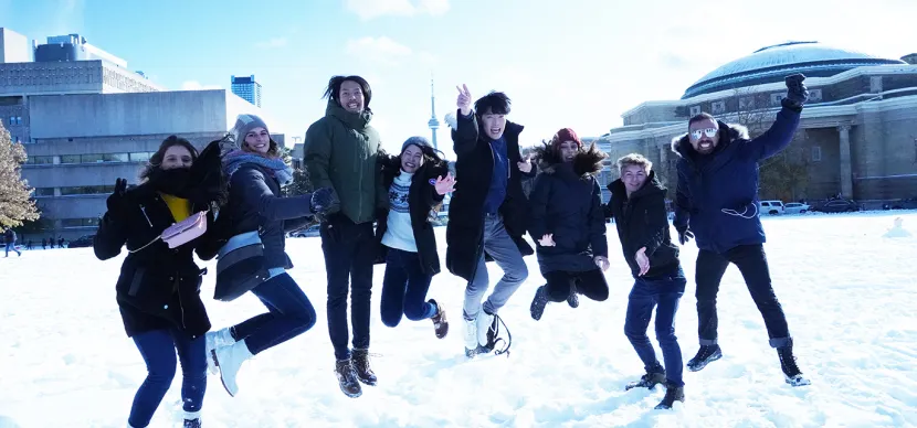 students jumping in the air in Toronto