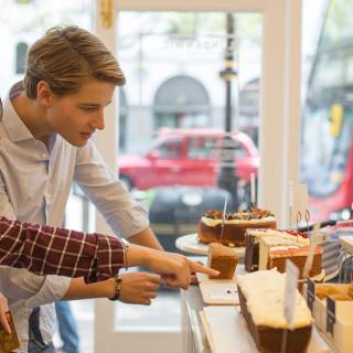 student choosing meals at a restaurant in london